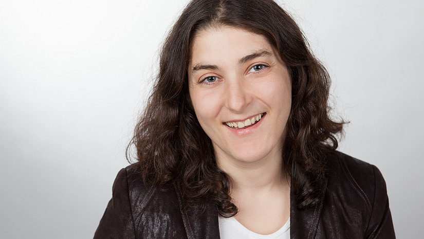 Smiling woman with dark hair