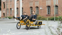 The team on a cargo bike.