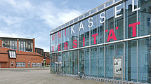 The photo shows the University of Kassel, Holländischer Platz campus